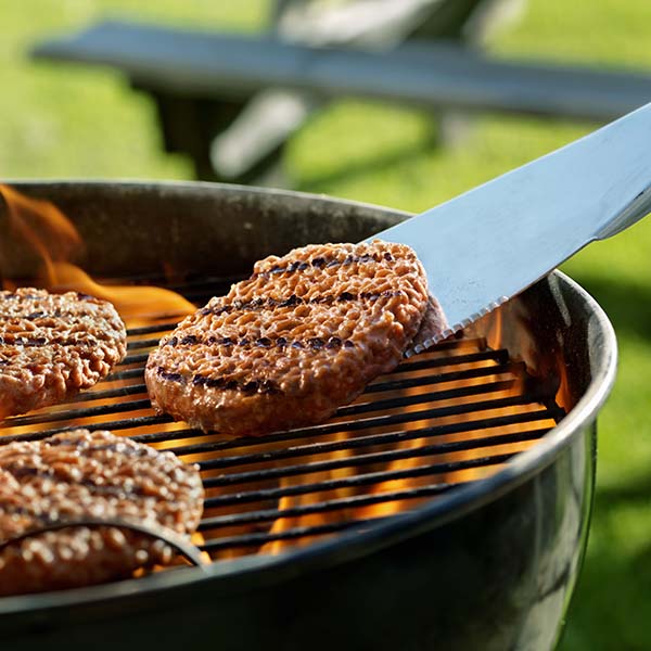 Cooking Burgers on a Backyard BBQ